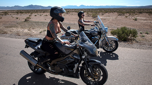 Anna Bell Peaks and Felicity Feline are back on the open road. They fill their need for speed racing through the desert with their tits out. Their trip is going as planned until the biker babes speed past Officer Sins napping in his car. He chases the babes to an abandoned warehouse. Officer Sins thinks he has Anna Bell and Felicity trapped, but these biker babes are reckless and thirsty for cock! (Video duration: 37 min)