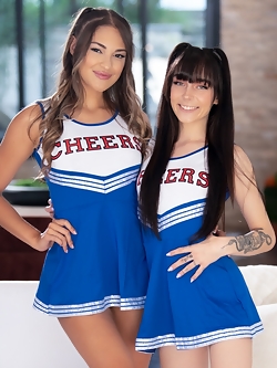 Emma Jade has been a high-school cheerleader for a while now, but she's SO happy that her friend Gizelle Blanco was able to join the squad recently. One day after cheerleading practice, however, Gizelle takes Emma aside and confides in her that she's feeling pretty anxious. As the newest cheerleader on the team, Gizelle's worried that she'll totally BOMB the upcoming championship. But luckily for her, her good friend Emma agrees to give her some one-on-one practice! But today is a different story, since Emma actually hurt her back recently. It seems like the extra practice will have to wait until she's all better. Gizelle looks concerned for her friend, though- is there anything that she can do to make Emma feel better? Well... maybe Gizelle could give Emma a massage... After all, cheerleaders are supposed to help each other out, right? Emma lies on her front, still in her cheerleading uniform, and lets the gorgeous Gizelle run her fingers across her shoulders and work out the kinks. Emma loves every second of it, and that's no coincidence since she just so happens to have a little crush on Gizelle. As the massage continues, both girls get so aroused that they decide that the NEXT part of the massage might just feel better WITHOUT their uniforms...